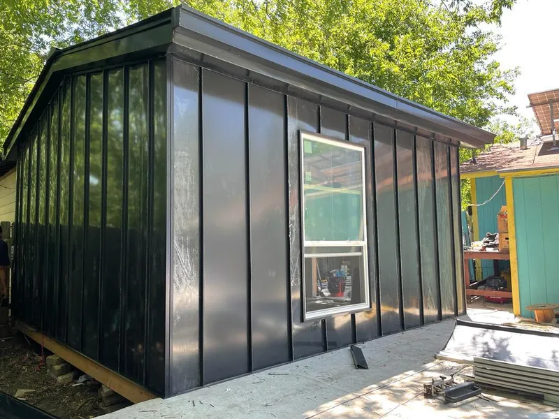 Black standing seam metal wall panels for Metal Roof Installation in Monroe